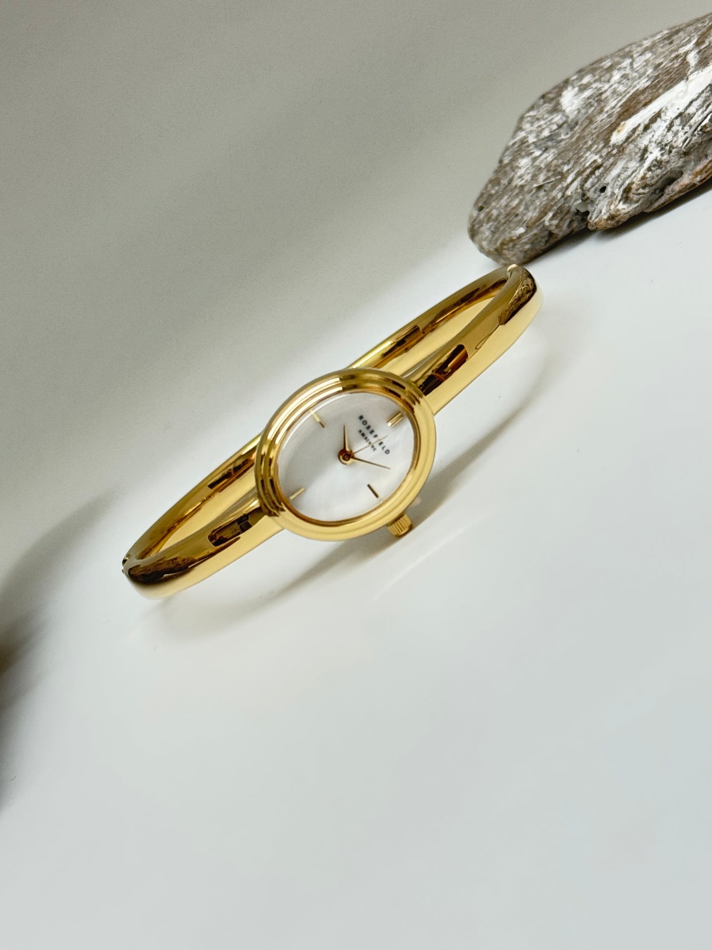 Montre bangle bracelet or Dessiné à Amsterdam/NY Montre bangle bracelet or STWGSG-ST05