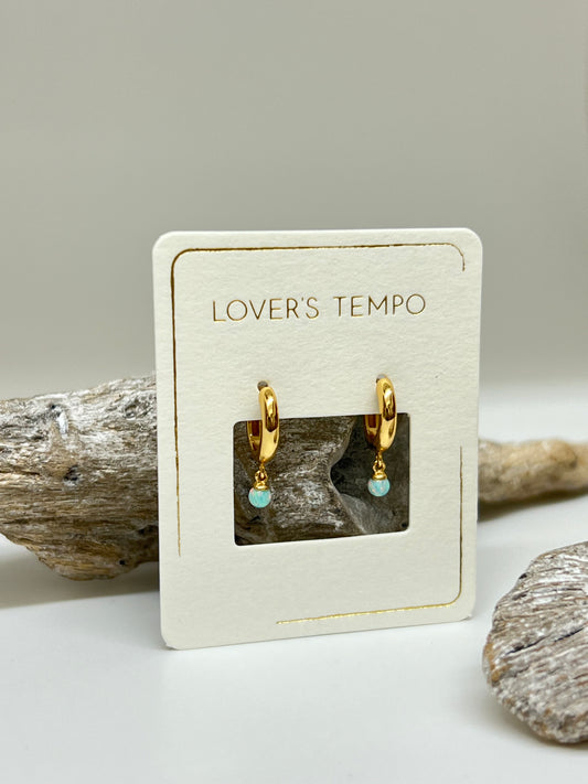 Boucles créoles Huggie Drop 11 mm opale bleue dessinée à Vancouver Lovers Tempo 1SU24008-WHT