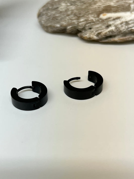 Boucles d'oreilles en Acier Dessinée à Montréal