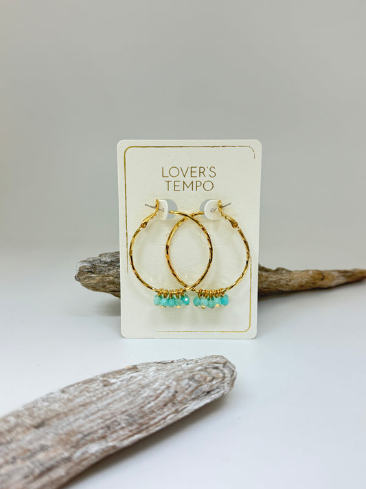 Boucles d'oreilles créoles de pierres précieuses Sorrento  dessinée à Vancouver