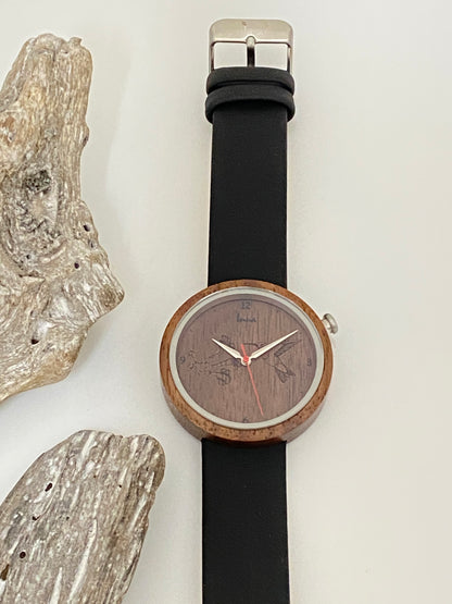 Montre Vol au Crépuscule en Bois Dessinée au Québec. Inua