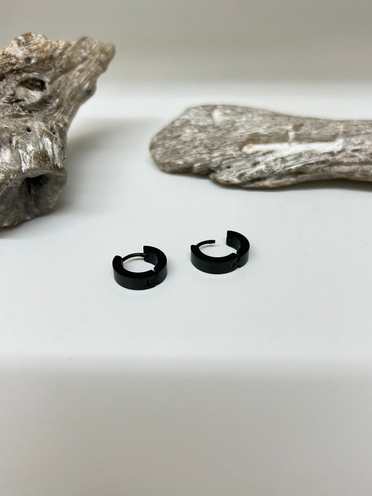 Boucles d'oreilles en Acier Dessinée à Montréal